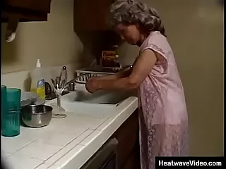 Elderly grandmother craves black plumber's attention as she eagerly performs oral sex on his thick shaft, ignores her pleas for water, and continues their unsavory encounter.